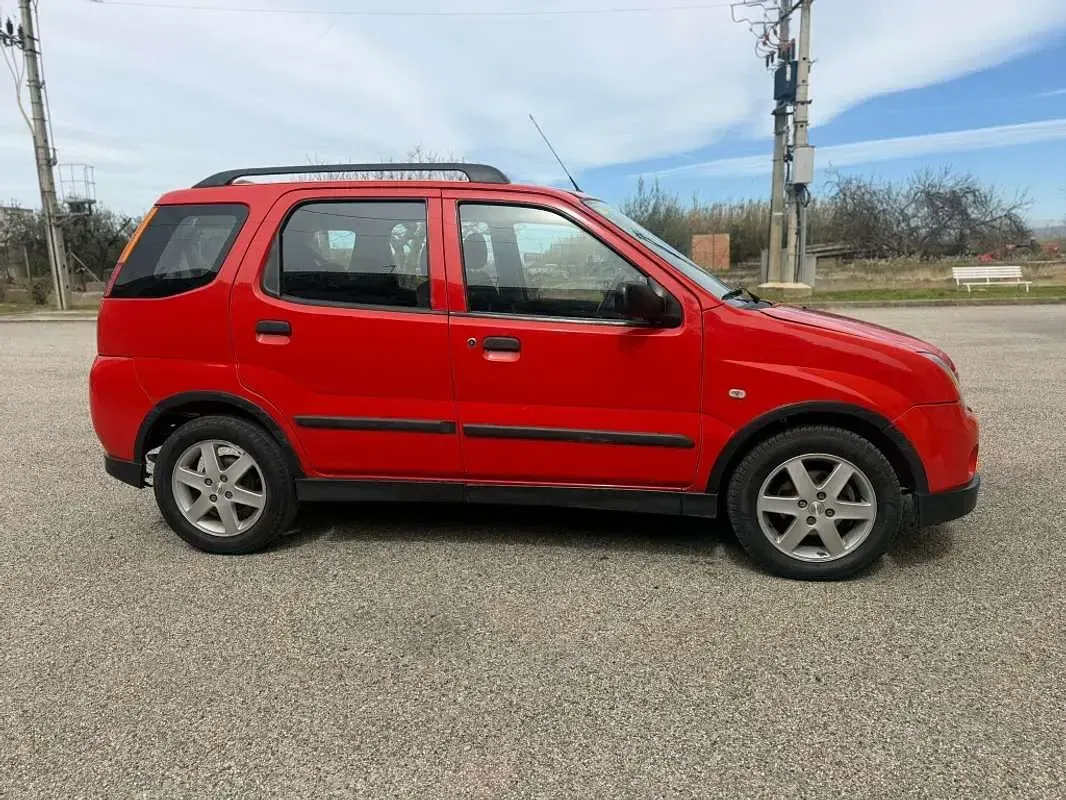 Usado Suzuki Ignis 99 CV (72 kW) 2005 Rojo Utilitario