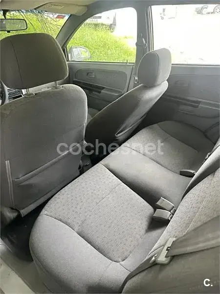 Usado Kia Rio 97 CV (71 kW) 2005 Gris / plata Berlina