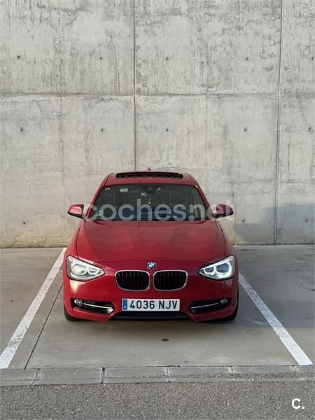 Usado BMW 118 Sport Line 170 CV (125 kW) 2012 Rojo Utilitario