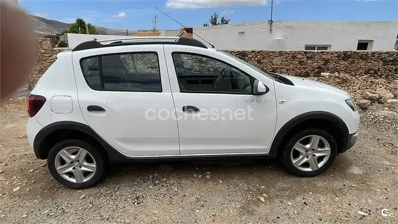 Usado Dacia Sandero Stepway 90 CV (66 kW) 2013 Blanco Berlina