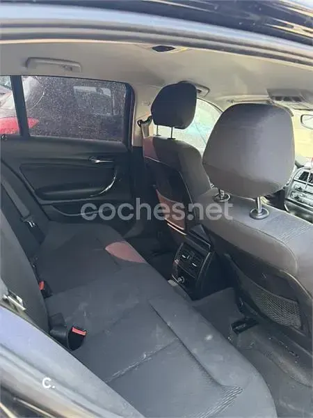 Usado BMW 116 122 CV (89 kW) 2012 Negro Utilitario