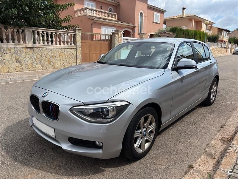 Gris / plata Usado 2013 BMW 114 Comfort Edition Utilitario | 9800 € (Un poco caro) - Imagen 1/4