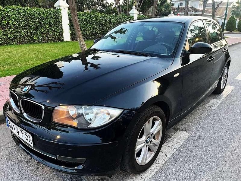Usado BMW 116 122 CV (89 kW) 2007 Negro Utilitario