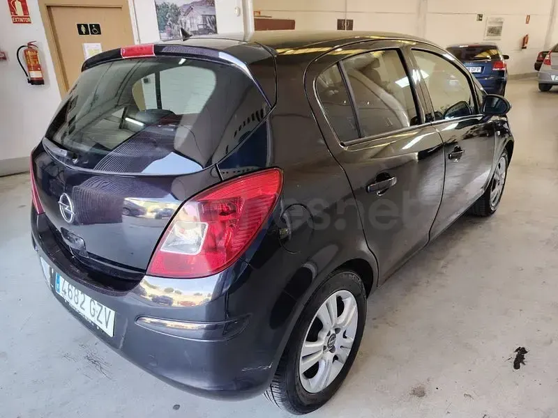Usado Opel Corsa 100 CV (73 kW) 2010 Negro Utilitario
