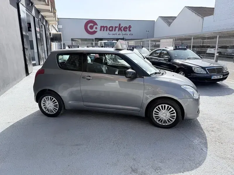 Usado Suzuki Swift GLX 92 CV (67 kW) 2005 Gris / plata Utilitario
