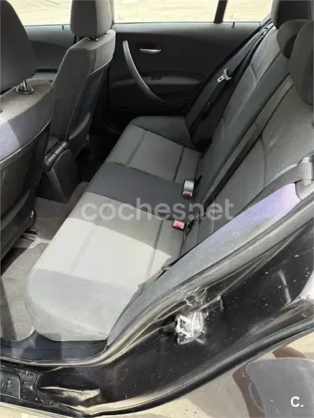 Usado BMW 118 122 CV (89 kW) 2006 Negro Utilitario