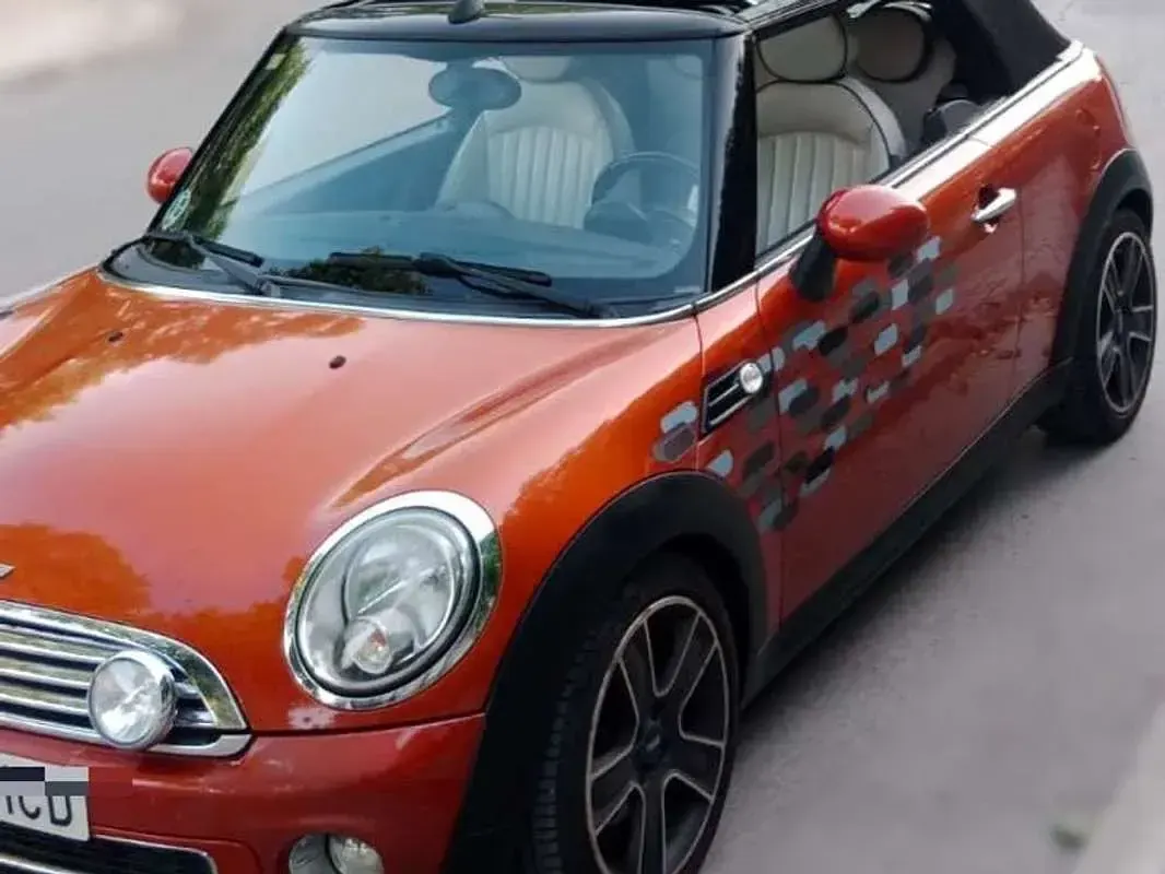 Usado Mini Cooper D 111 CV (81 kW) 2011 Naranja Utilitario