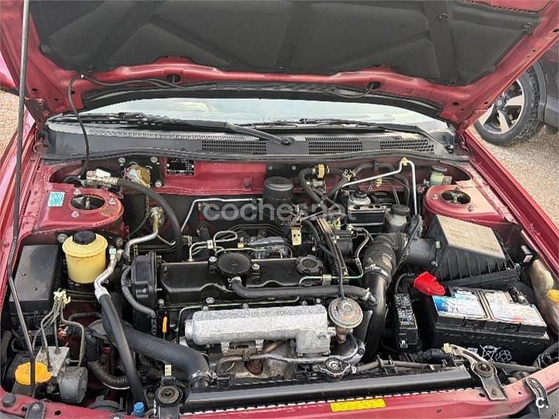 Usado Nissan Primera Comfort 90 CV (66 kW) 2000 Granate Familiar