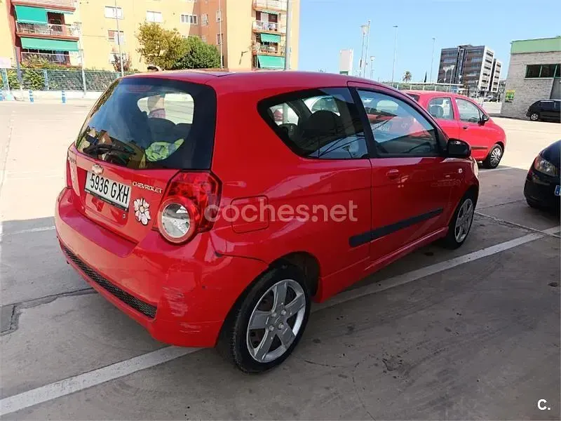 Usado Chevrolet Aveo LS 84 CV (61 kW) 2010 Rojo Berlina