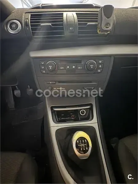 Usado BMW 118 122 CV (89 kW) 2007 Negro Utilitario