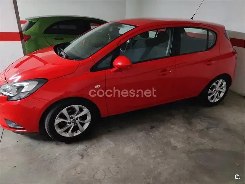 Usado Opel Corsa Selective 90 CV (66 kW) 2015 Rojo Utilitario
