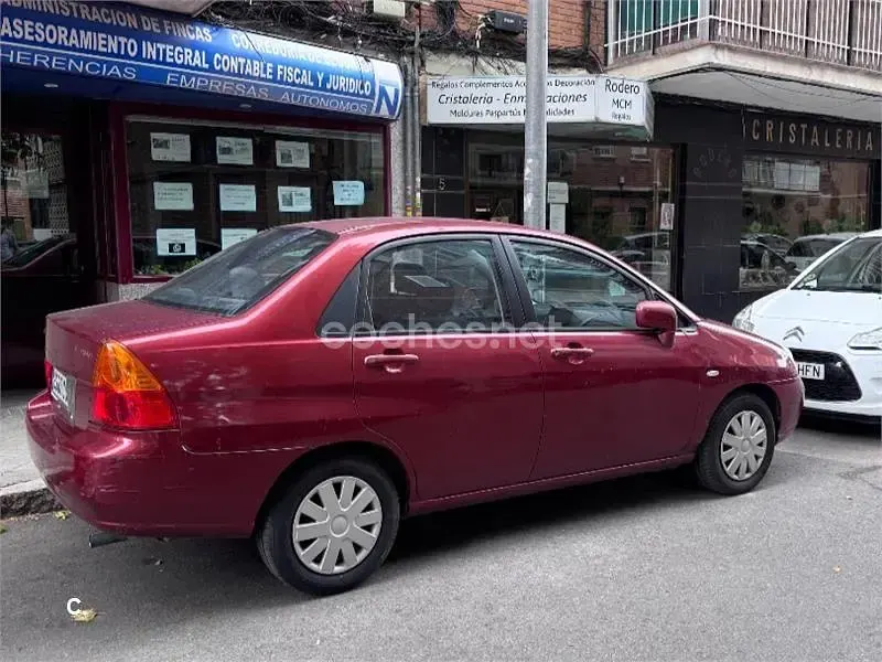 Usado Suzuki Liana 103 CV (75 kW) 2004 Rojo Berlina
