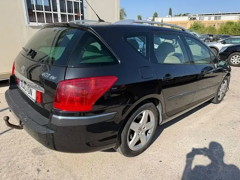 Usado Peugeot 407 136 CV (100 kW) 2005 Negro Familiar