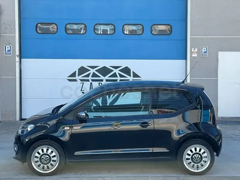 Usado VW up! 75 CV (55 kW) 2013 Negro Utilitario