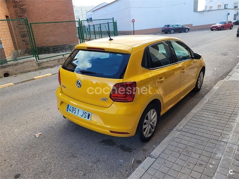 Używany VW Polo Advance 90 KM (66 kW) 2016 Pomarańczowy Sedan/Limuzyna