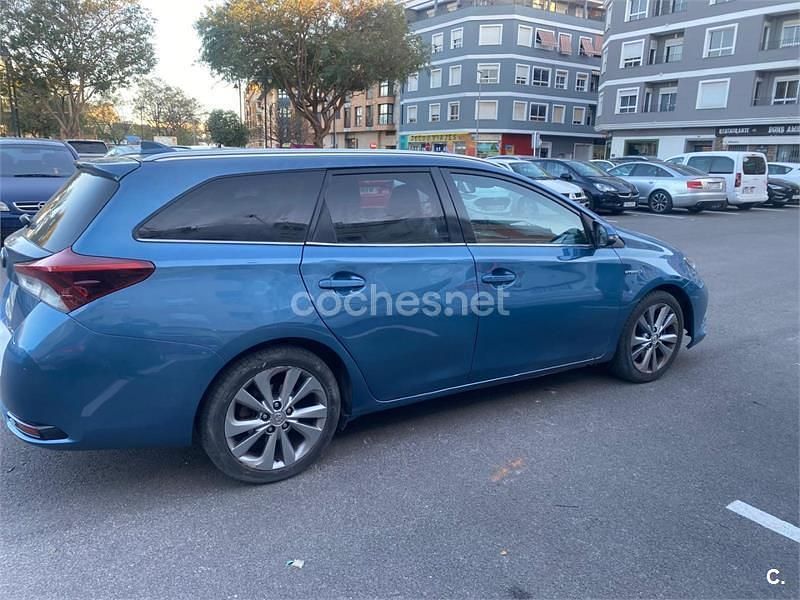 Usado Toyota Auris Hybrid Advance 136 CV (100 kW) 2016 Azul Familiar