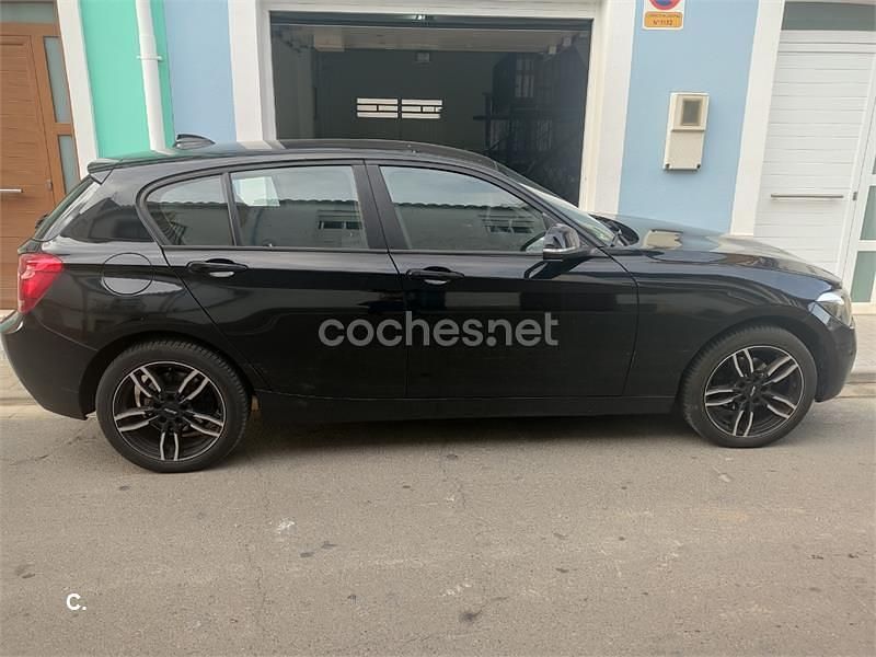 Usado BMW 116 Comfort Edition 122 CV (89 kW) 2012 Negro Utilitario