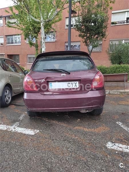 Usado Nissan Almera 98 CV (72 kW) 2004 Granate Berlina
