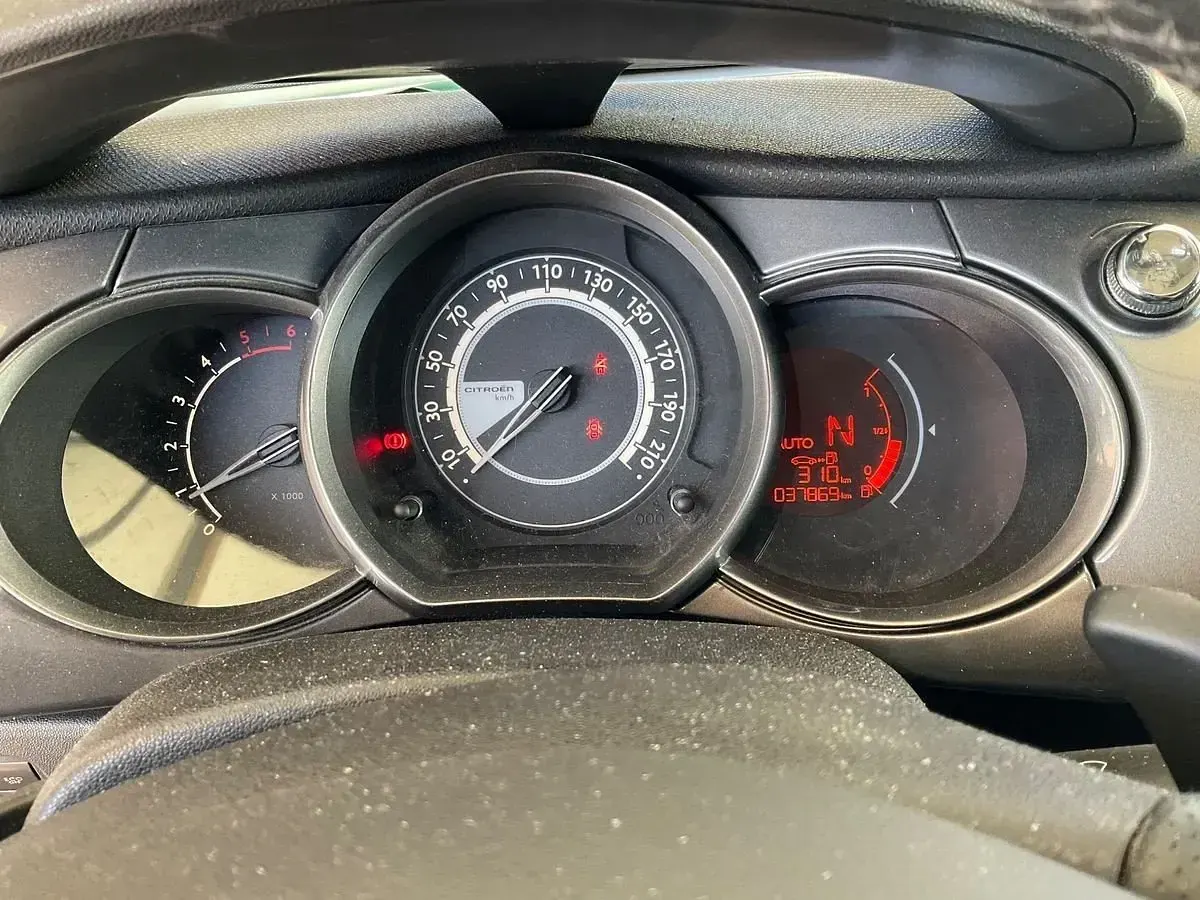 Usado Citroën C3 Exclusive 92 CV (67 kW) 2014 Granate Berlina
