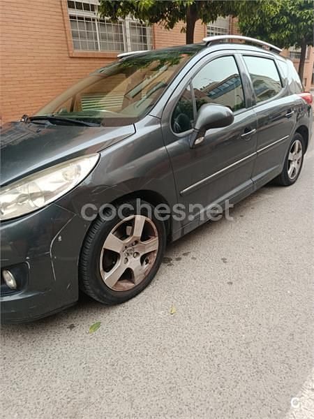 Usado Peugeot 207 Outdoor Outdoor 112 CV (82 kW) 2011 Gris / plata Familiar