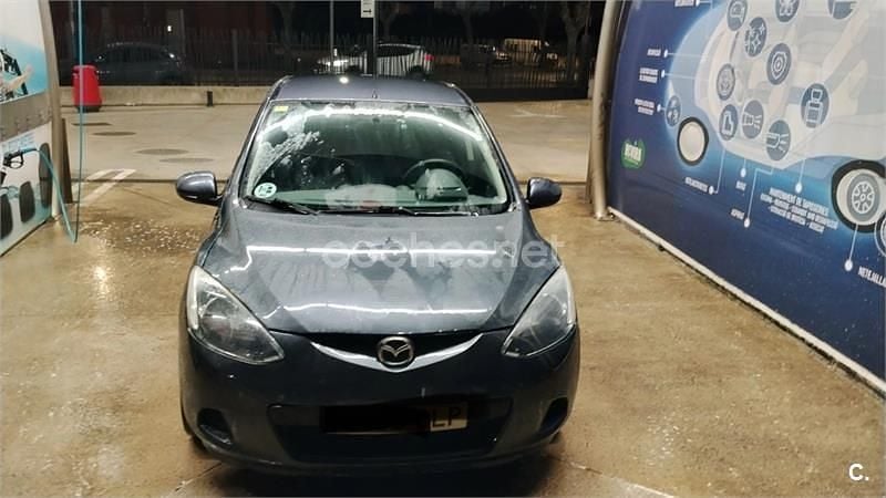 Usado Mazda 2 Active 68 CV (50 kW) 2009 Granate Utilitario