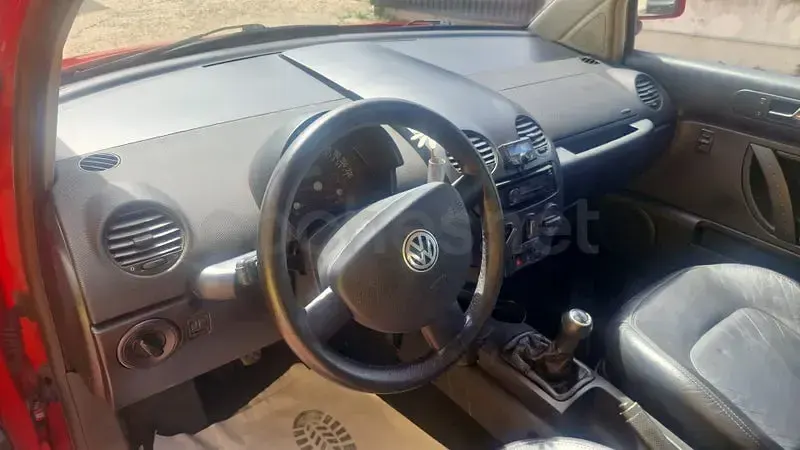 Usado VW New Beetle 90 CV (66 kW) 1999 Rojo Utilitario