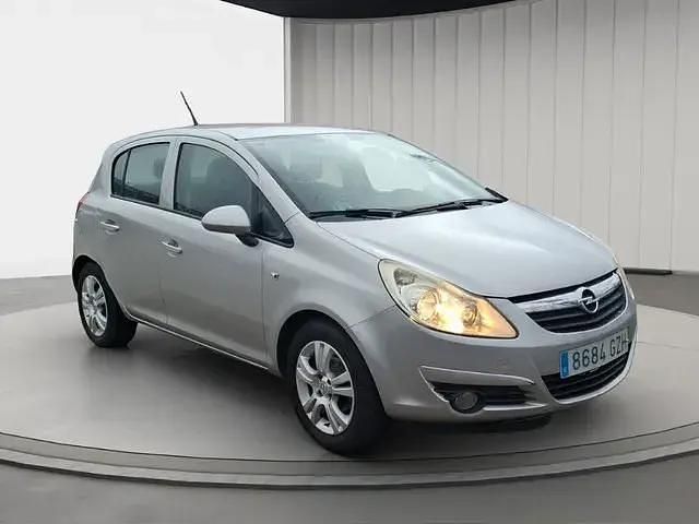 Usado Opel Corsa 86 HP (63 kW) 2010 Cinzento Sedan