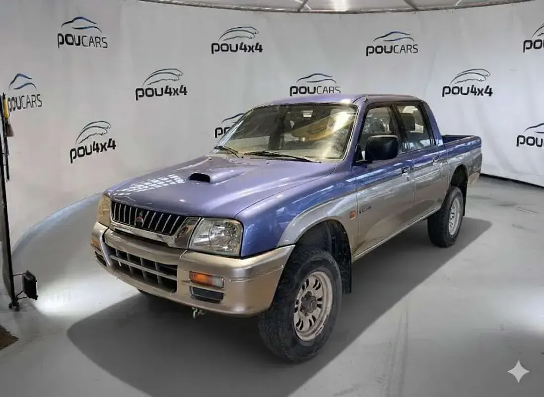 Usado Mitsubishi L200 99 CV (72 kW) 1998 Azul Pickup/Camioneta