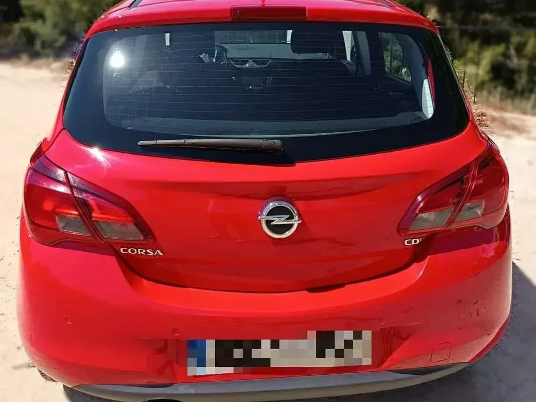 Usado Opel Corsa Selective 95 CV (69 kW) 2016 Rojo Utilitario