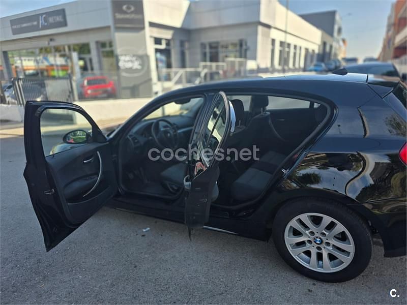 Usado BMW 116 115 CV (84 kW) 2006 Negro Utilitario