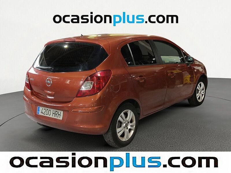 Usado Opel Corsa Expression 86 CV (63 kW) 2013 Naranja Utilitario