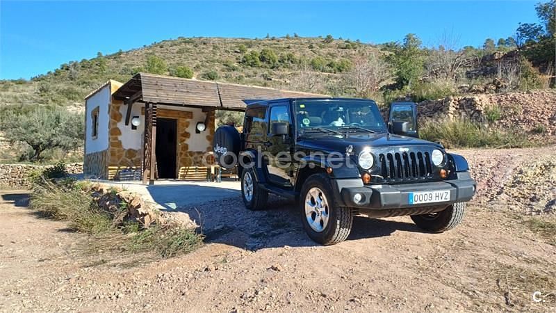 Usado Jeep Wrangler Sahara 200 CV (147 kW) 2014 Negro SUV