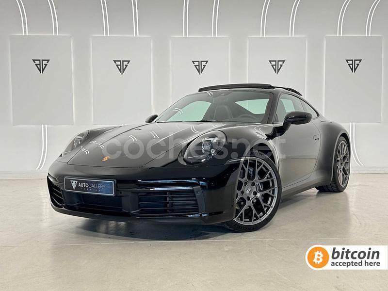 Negro Usado 2024 Porsche 911 Carrera 4 Coupe | 144.900 € - Imagen 1/4