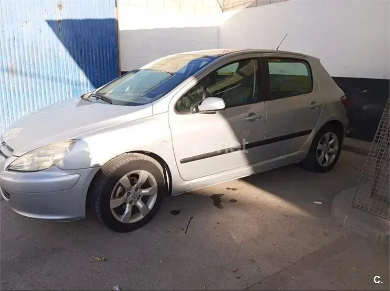Usado Peugeot 307 110 CV (80 kW) 2003 Gris / plata Berlina