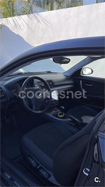 Usado BMW 118 143 CV (105 kW) 2007 Negro Utilitario