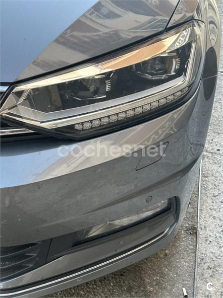 Gris / plata Usado 2017 VW Touran Advance Monovolumen | 17.999 € (Precio justo) - Imagen 1/4