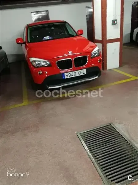 Używany BMW X1 143 KM (105 kW) 2011 Czerwony SUV