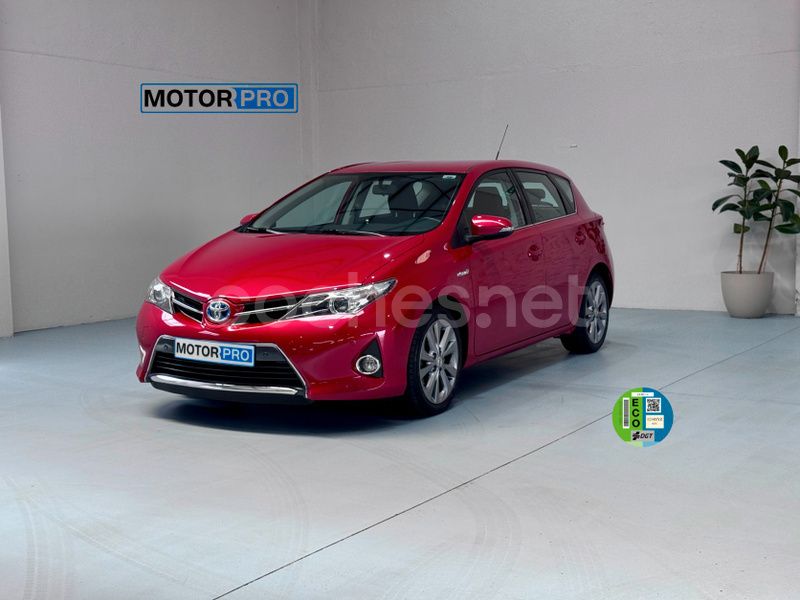 Granate Usado 2013 Toyota Auris Hybrid Active Berlina | 10.990 € (Precio justo) - Imagen 1/4