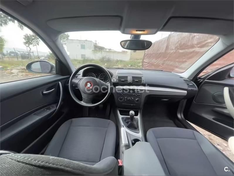 Usado BMW 116 122 CV (89 kW) 2009 Negro Utilitario