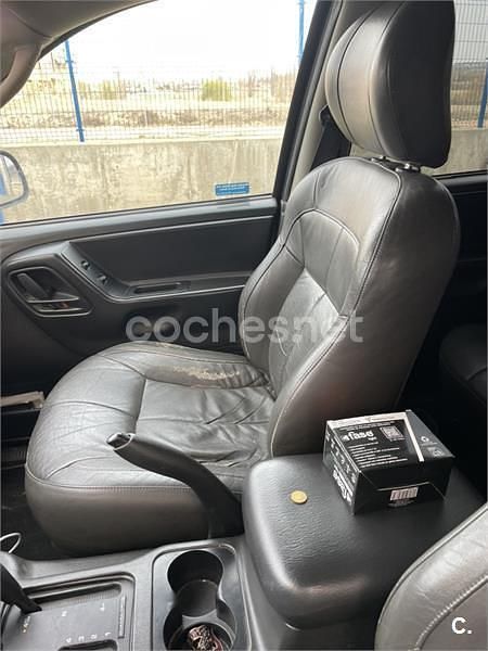 Usado Jeep Grand Cherokee Laredo 163 CV (119 kW) 2002 Gris / plata SUV