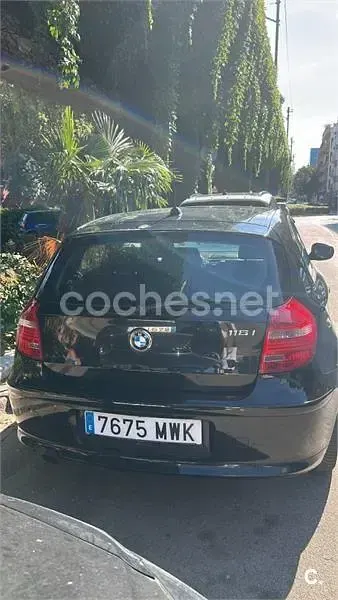 Usado BMW 116 122 CV (89 kW) 2010 Negro Utilitario