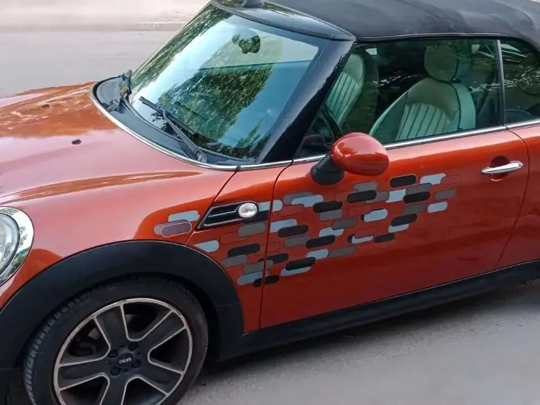 Usado Mini Cooper D 111 CV (81 kW) 2011 Naranja Utilitario