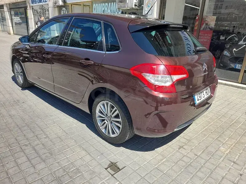 Usado Citroën C4 Exclusive 112 CV (82 kW) 2012 Granate Berlina