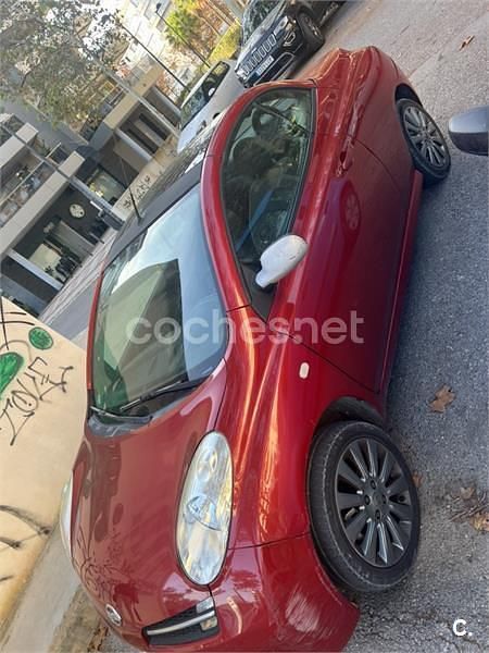 Rojo Usado 2007 Nissan Micra C+C Descapotable | 3500 € - Imagen 1/2