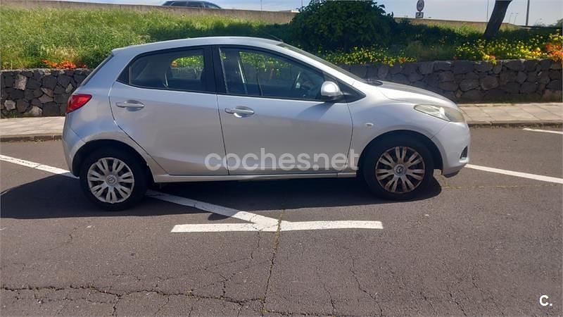 Usado Mazda 2 Active 86 CV (63 kW) 2009 Gris / plata Utilitario