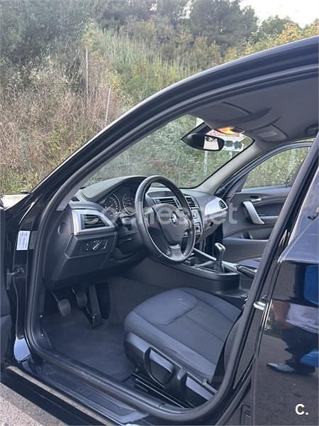Usado BMW 116 122 CV (89 kW) 2012 Negro Utilitario