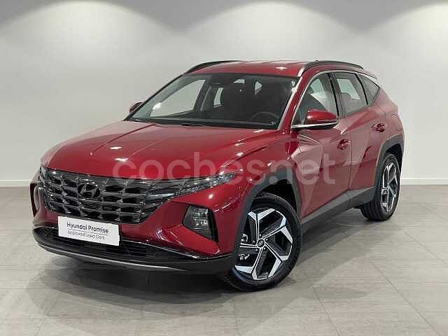 Sunset red Usado 2024 Hyundai Tucson SUV | 39.450 € - Imagen 1/3