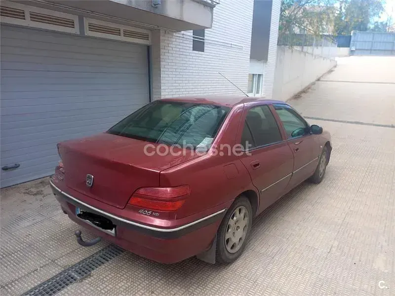 Usado Peugeot 406 90 CV (66 kW) 2001 Granate Berlina