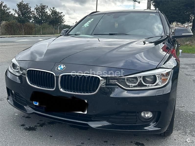 Negro Usado 2013 BMW 318 Familiar | 9990 € (Un poco caro) - Imagen 1/4