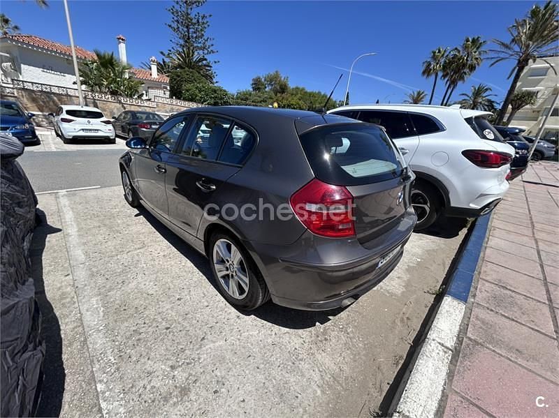 Usado BMW 118 129 CV (94 kW) 2007 Marrón Utilitario